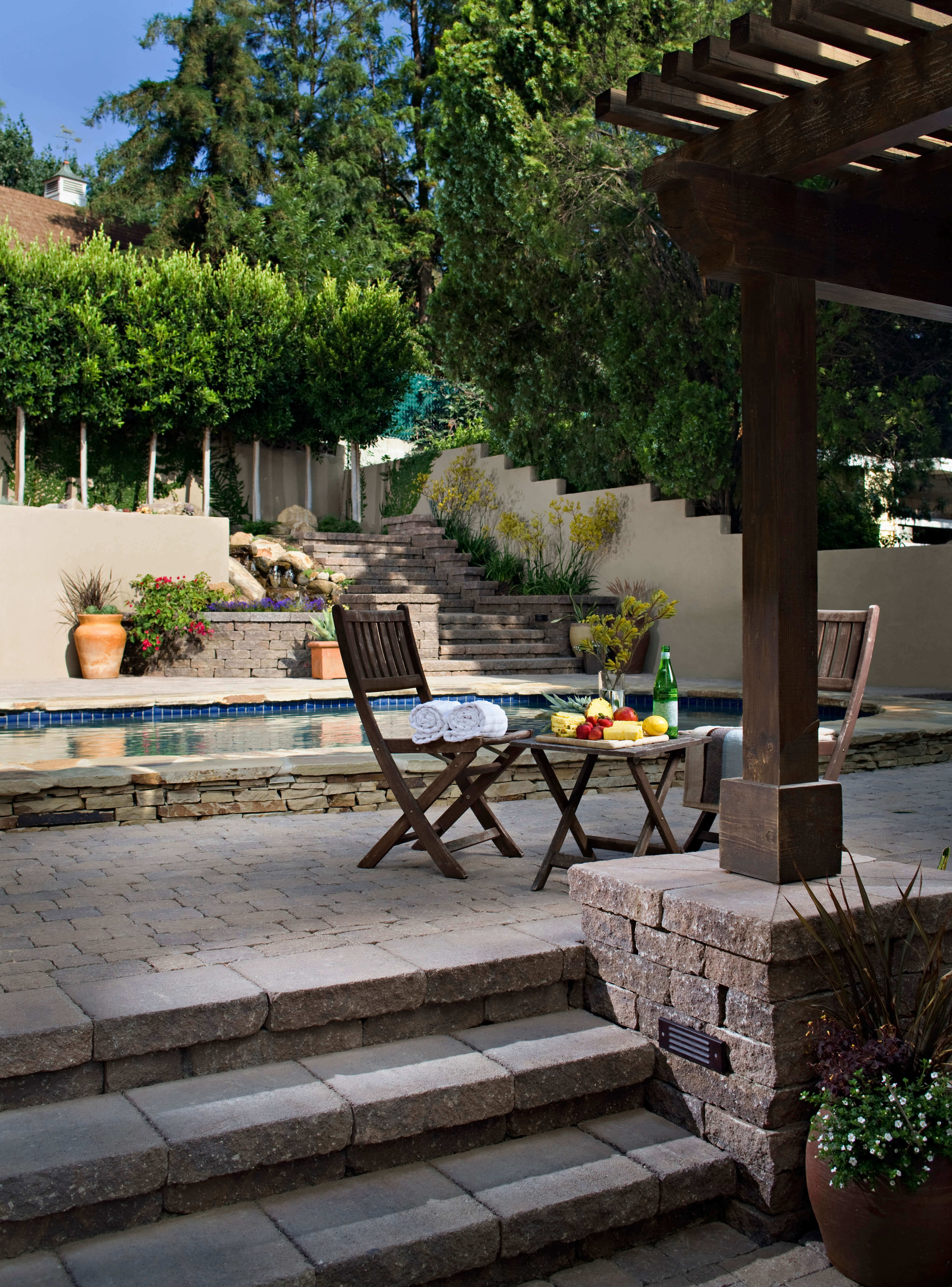 stone hardscape and patio for a backyard retreat design idea