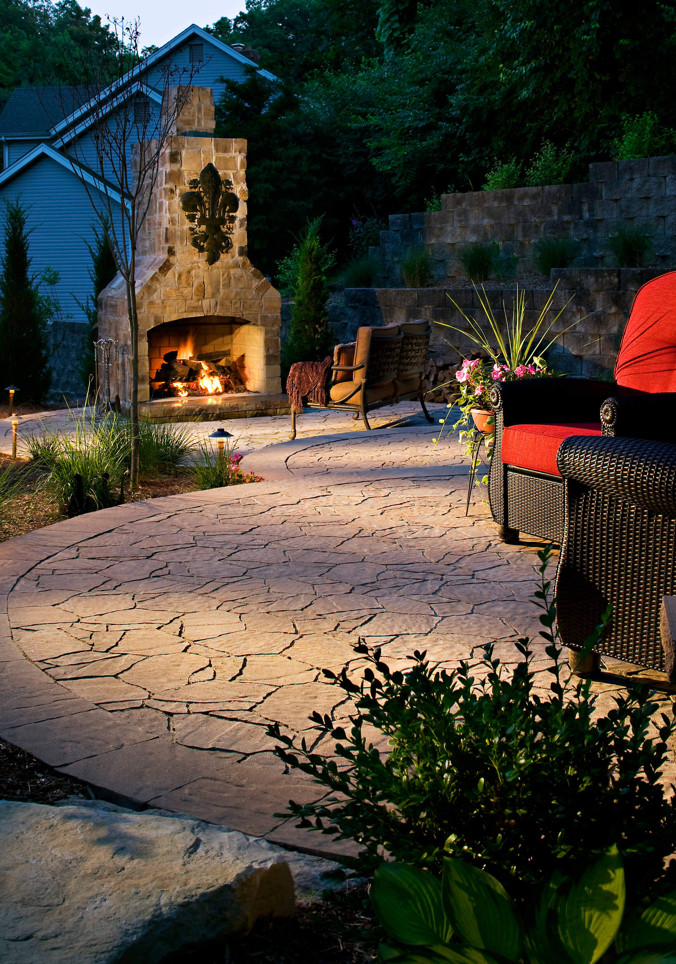 Stone fireplace custom built and paver design patio