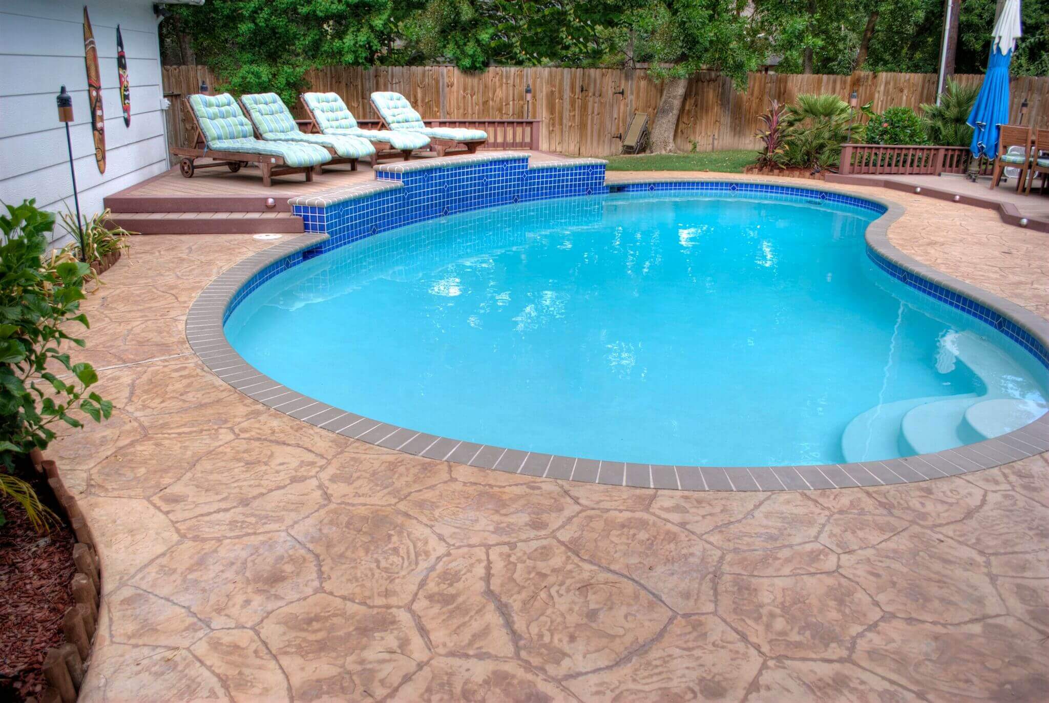 Decorative finish pool decks Dallas Texas backyard design idea