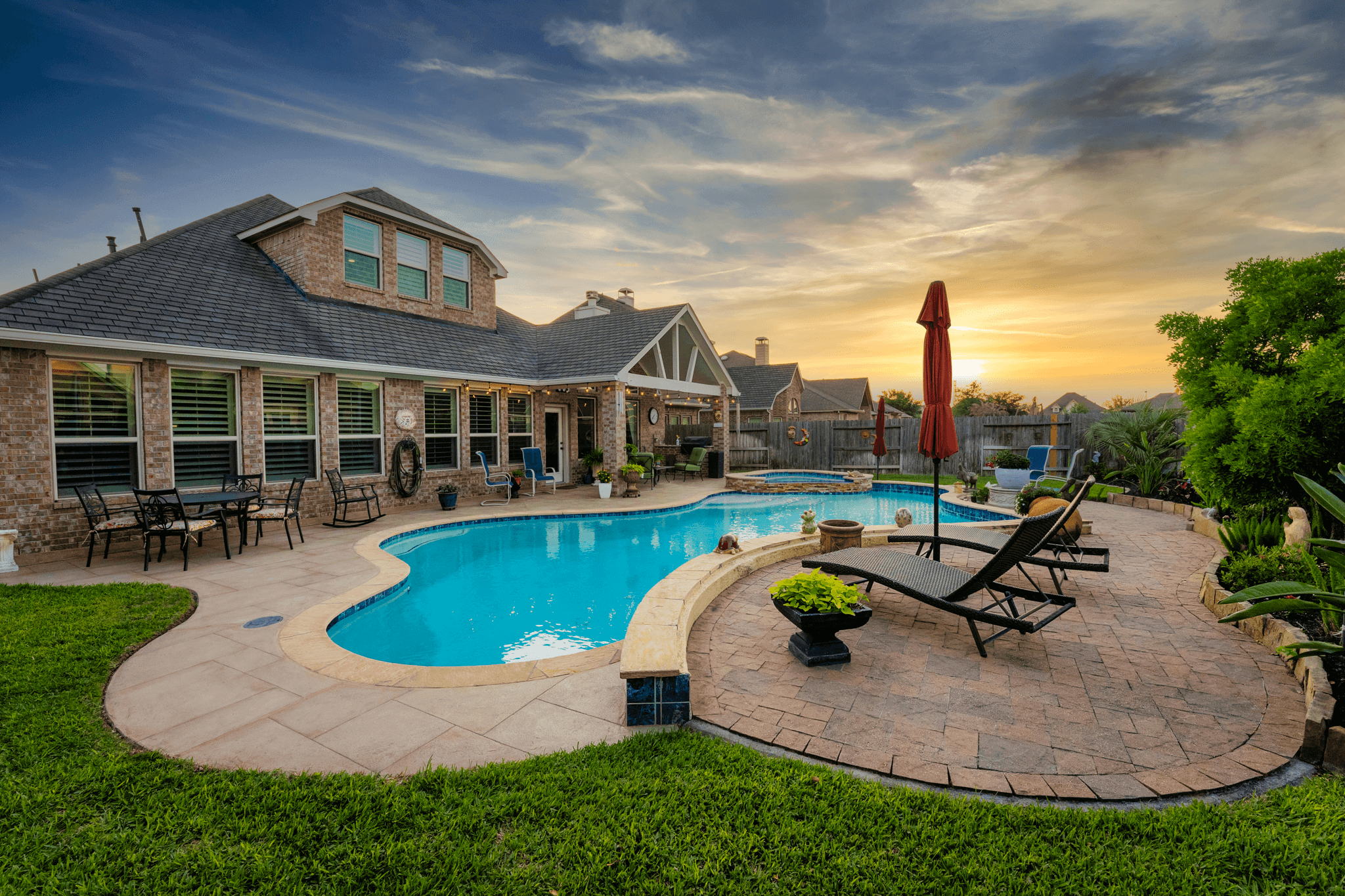 Houston Backyard Carvestone and paver pool decking hardscape solution