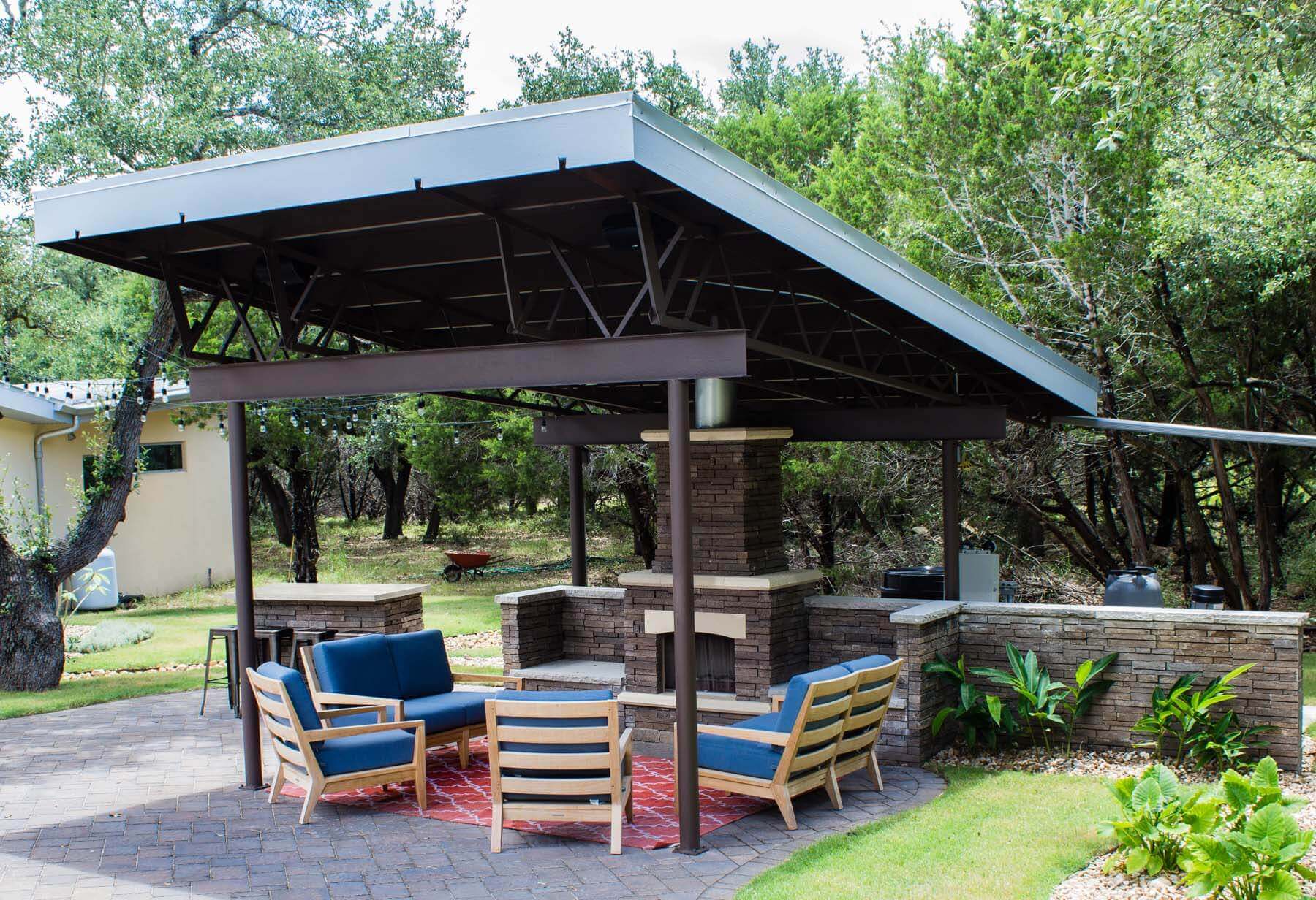Custom built aluminum shade structure and fireplace