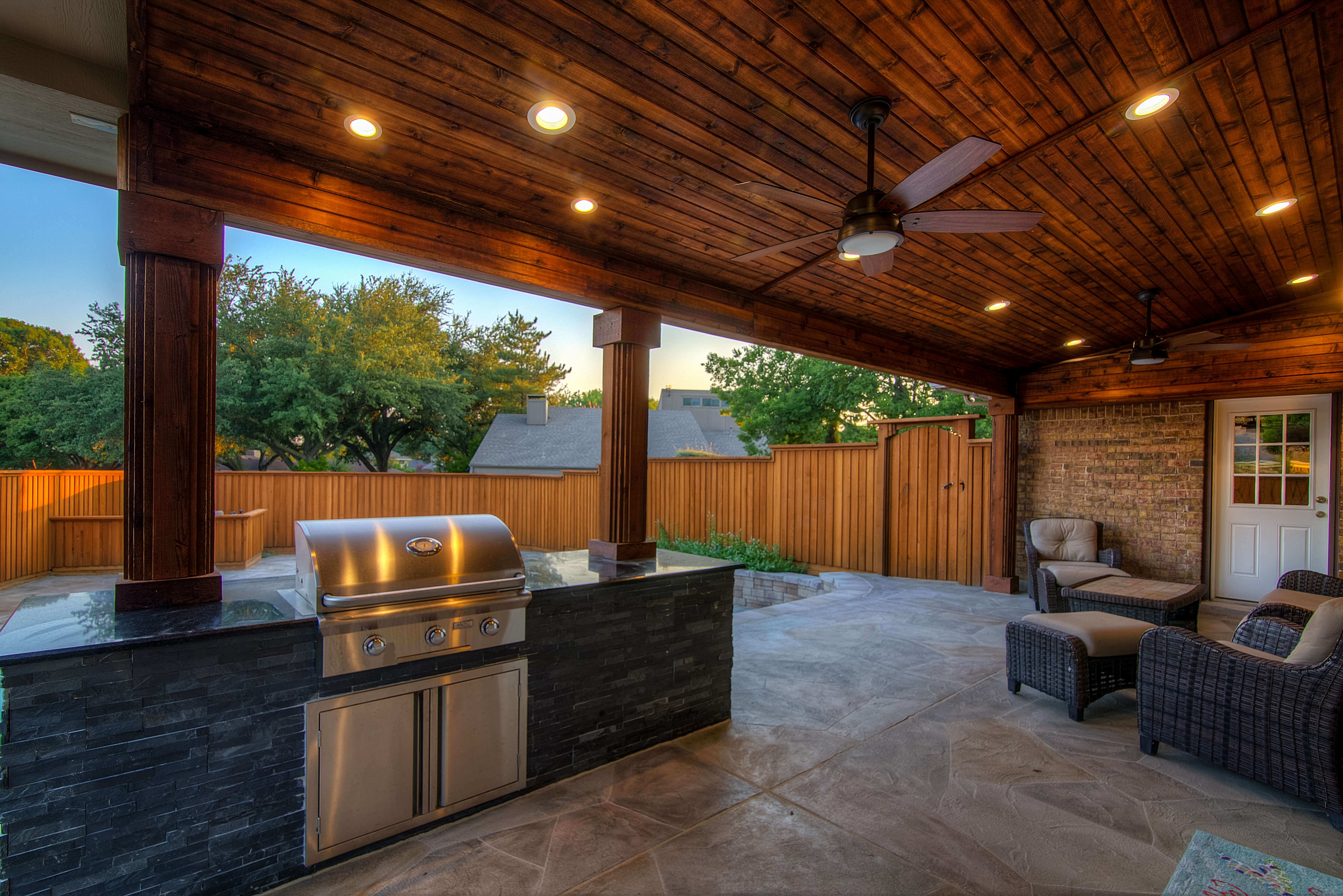 Cedar patio cover and outdoor grilling area backyard idea