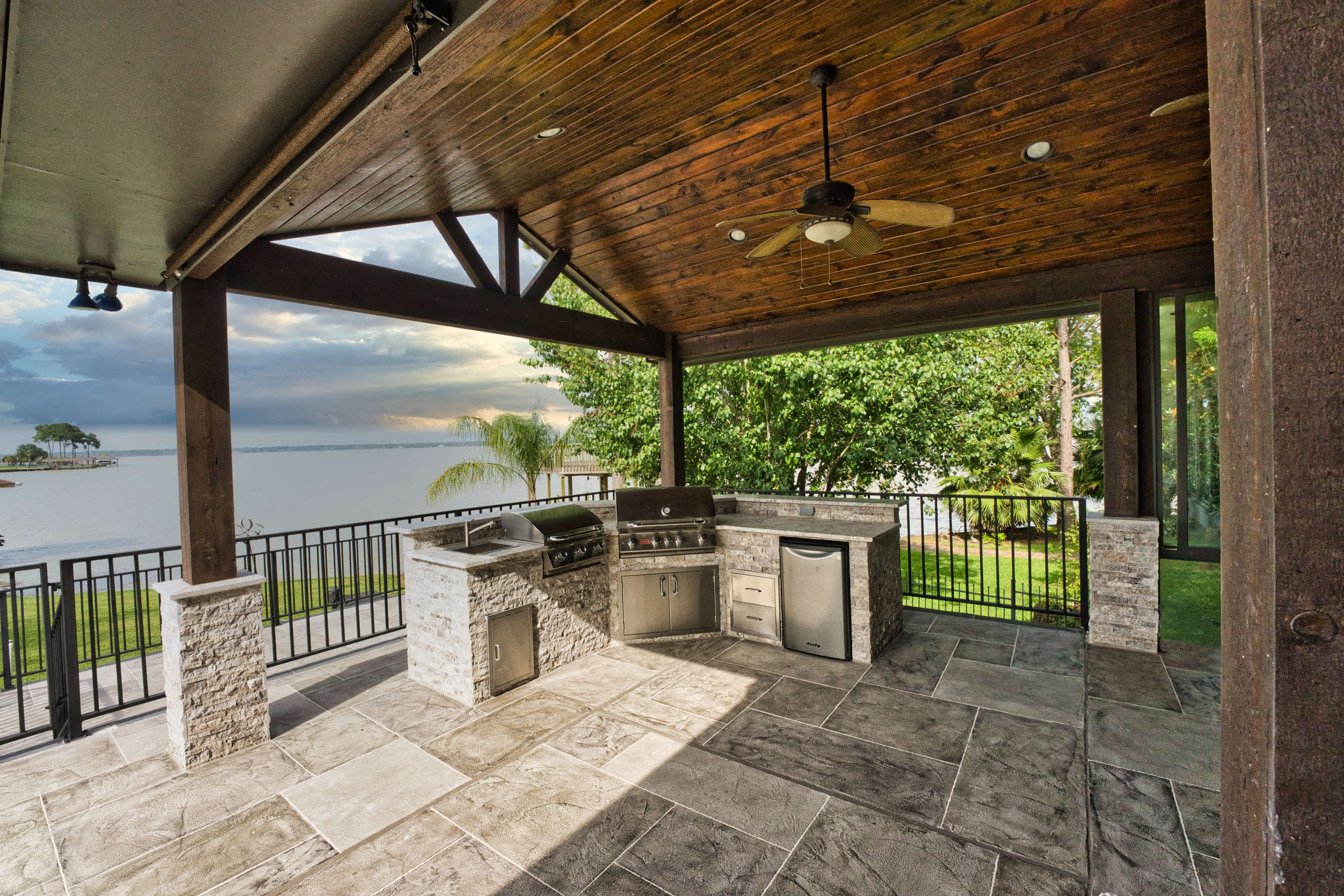 Outdoor kitchen grill and cedar patio cover