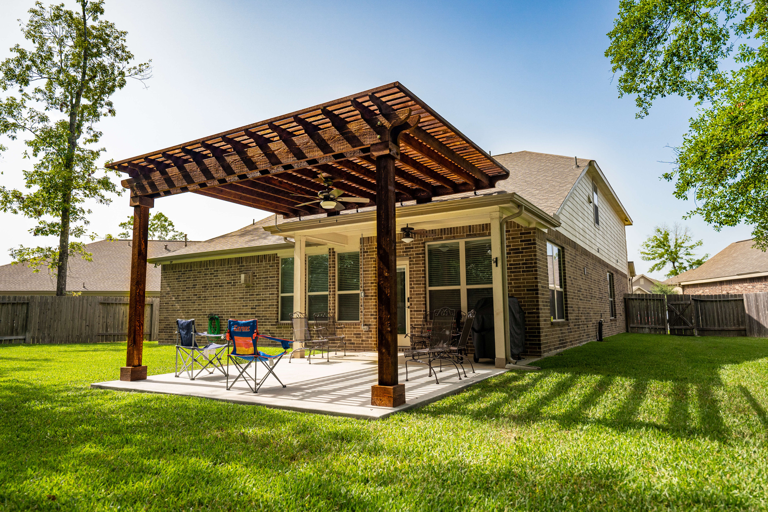 Pergola extension built for partial shade in backyard