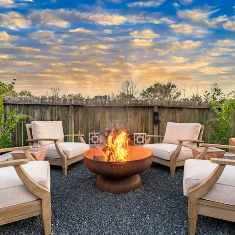 Firepit seating area with plush outdoor furniture