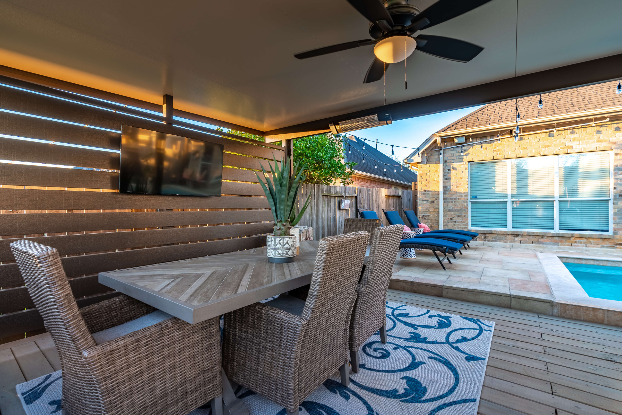 Aluminum patio cover outdoor living room and dining area