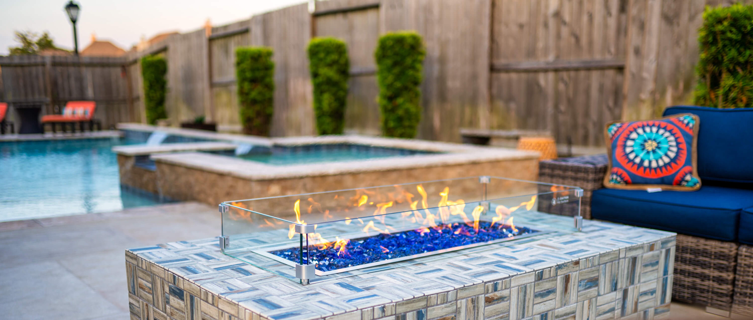 Blue stone firepit mosaic design custom built backyard inspiration