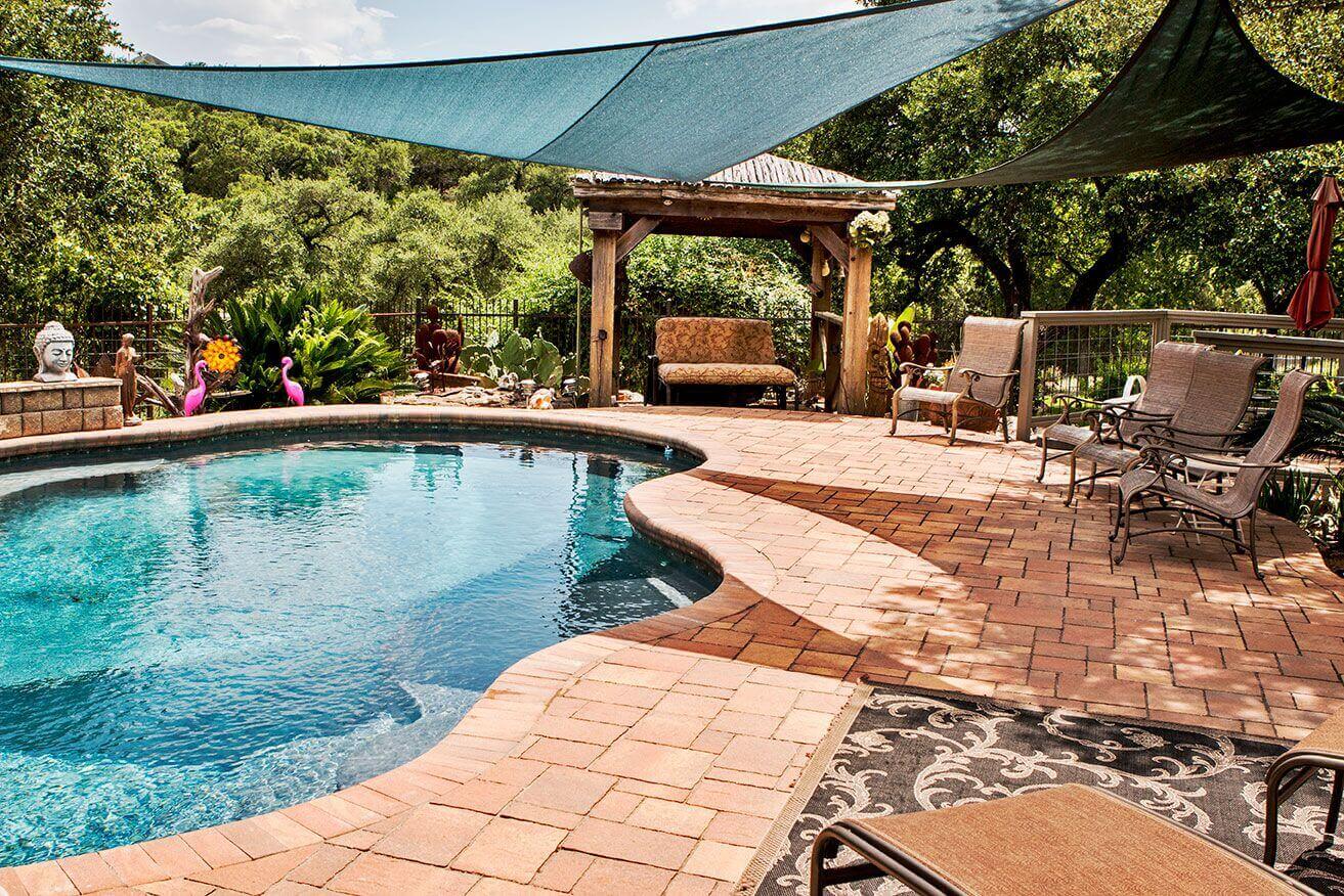 Rounded edges inground pool shape design Fort Worth Texas