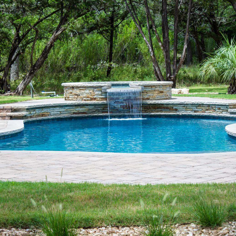 Backyard pool and water fountain feature in Austin Texas