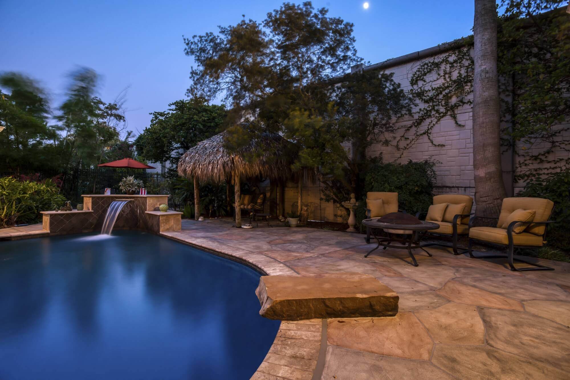 outdoor backyard luxury pool build diving rock