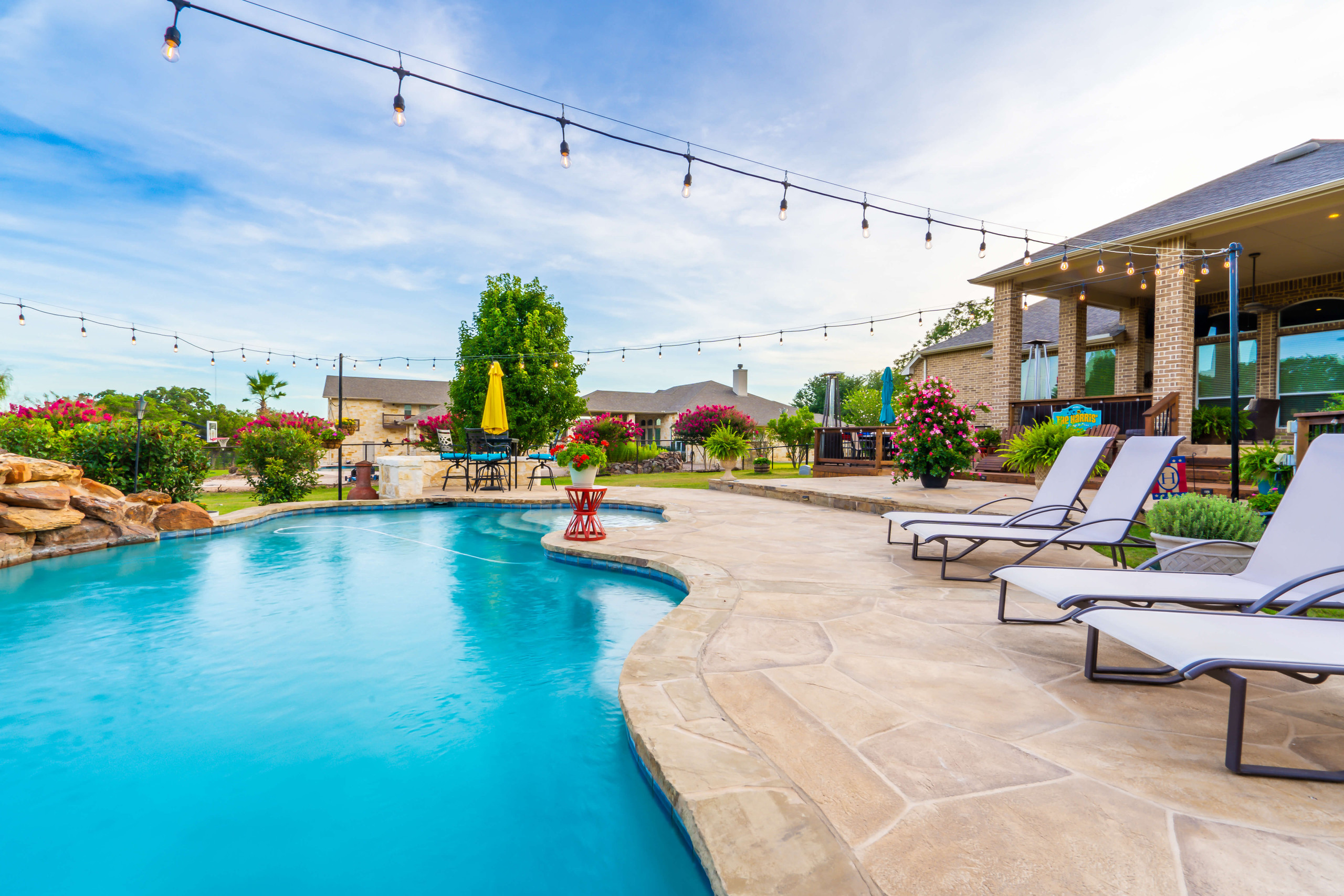 Backyard pool remodel carvestone pool decking in San Antonio Texas