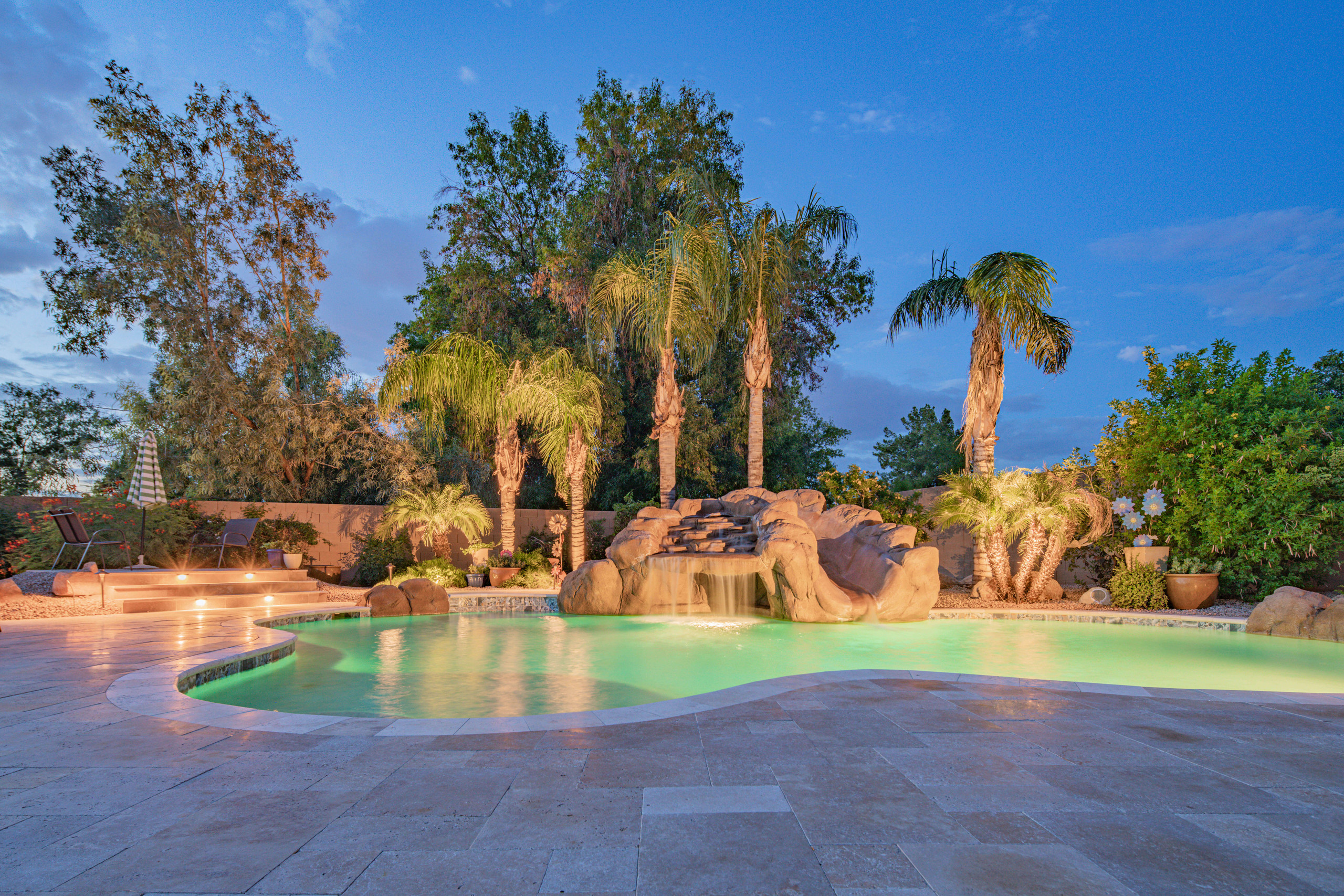 Backyard pool oasis remodel inground custom freeform design