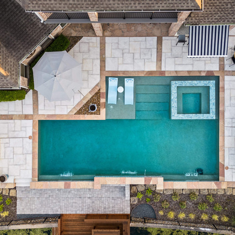 backyard oasis pool remodel patio carvestone pool decking overlay