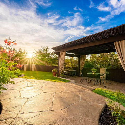 backyard patio carvestone overlay pergola retreat