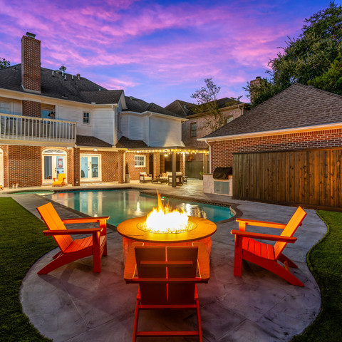 backyard firepit fire feature outdoor living room patio pool deck