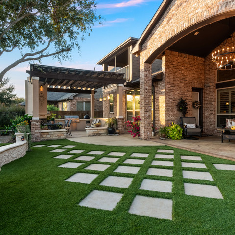 backyard patio outdoor living room design idea turf landscaping