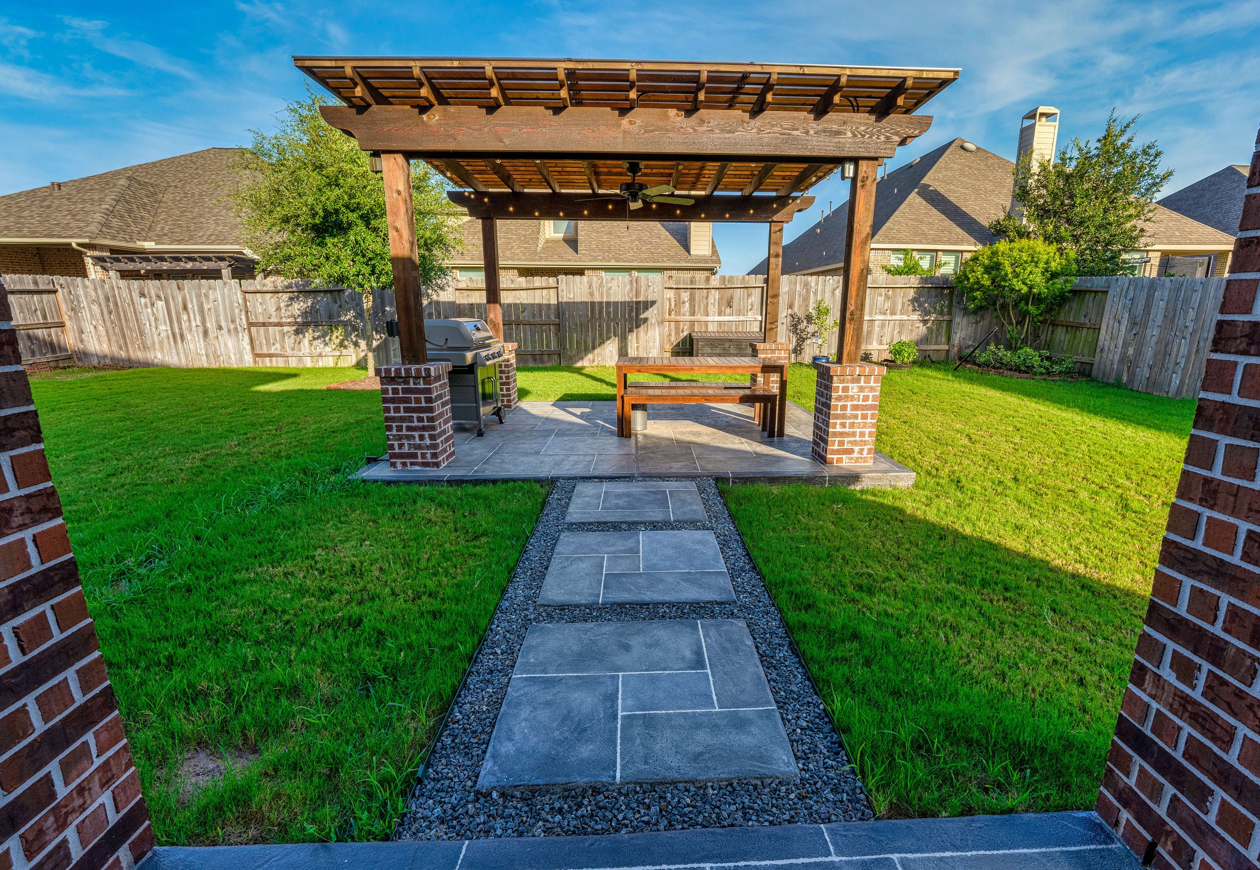 Carvestone design with pergola and patio overlay in Houston Texas
