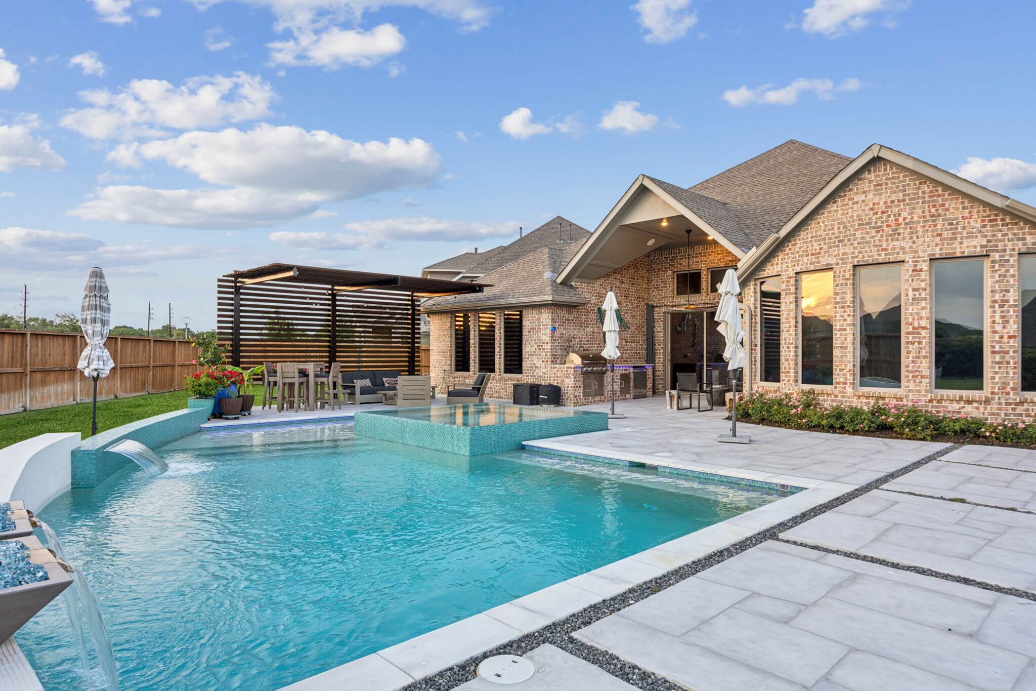 backyard pool remodel carvestone overlay design idea
