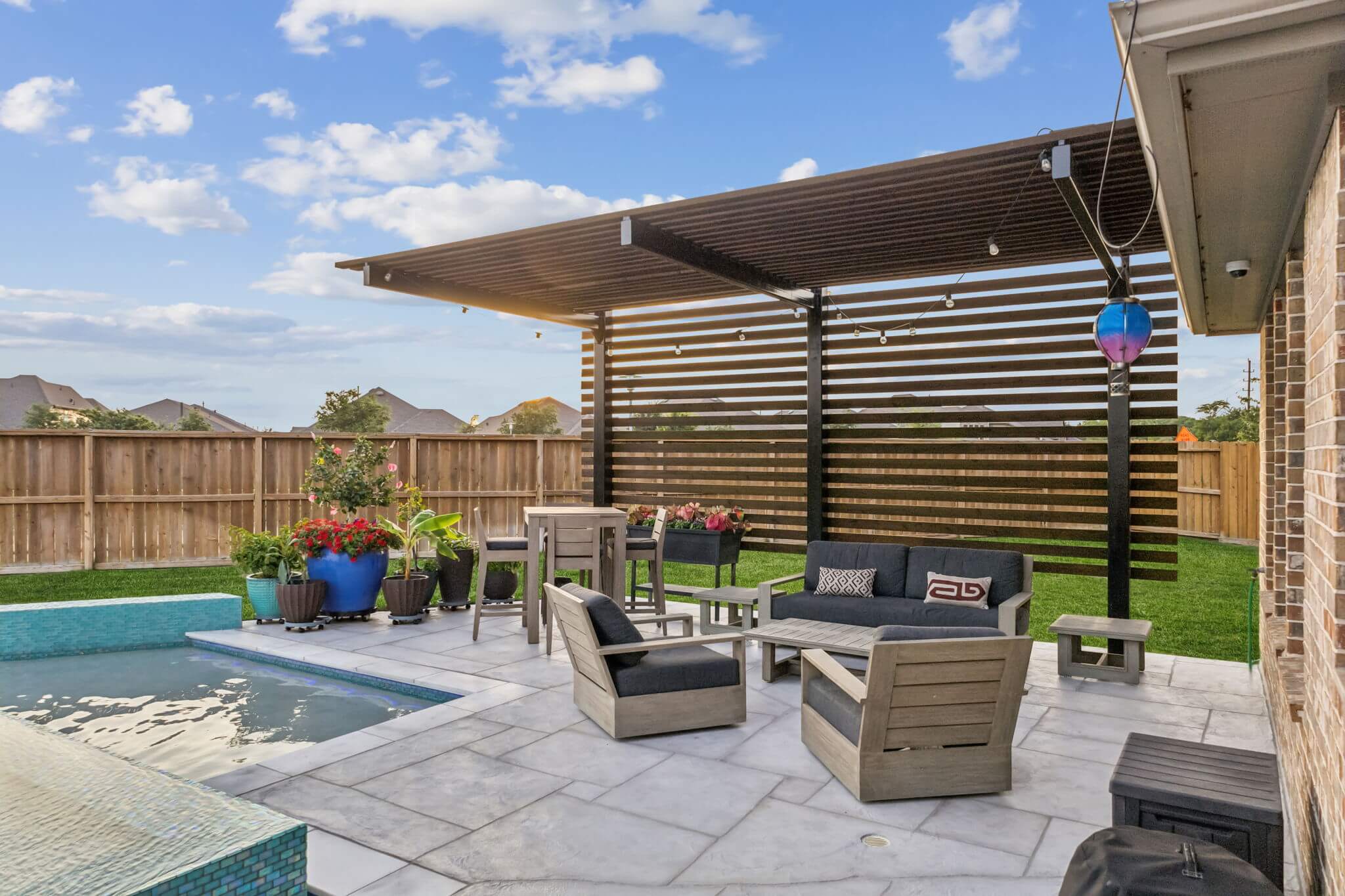 backyard pool deck and patio outdoor living room design