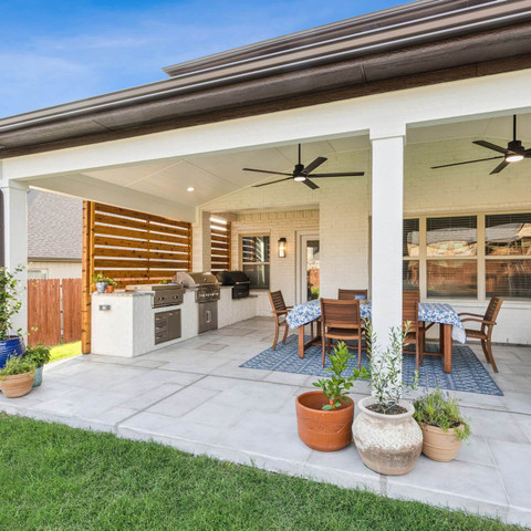 outdoor kitchen cedar privacy wall custom carvestone overlay