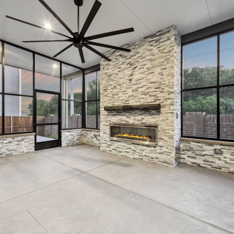 stone fireplace gray carvestone overlway patio screens aluminum patio cover