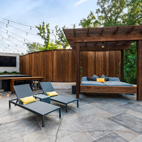 custom carvestone overlay patio pergola stone wall shade structure