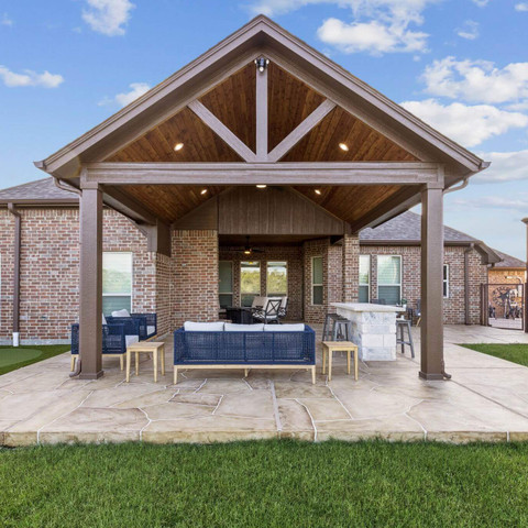 gable patio cover carvestone overlay patio fireplace outdoor kitchen