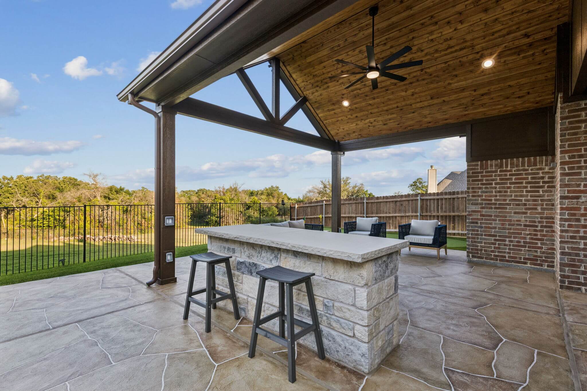 stone outdoor kitchen patio cover carvestone overlay