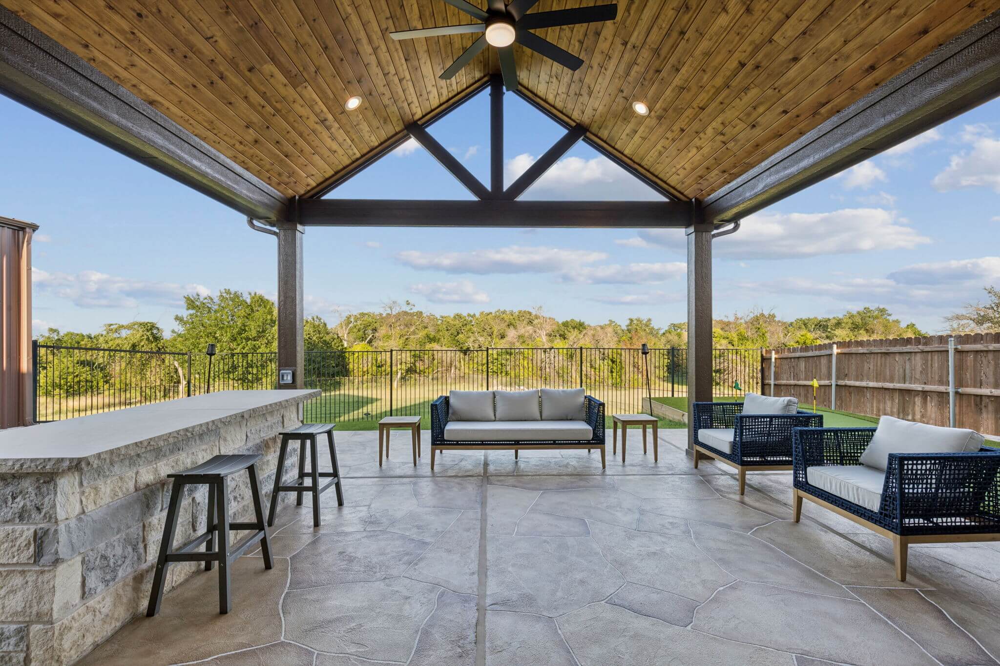 open gable patio cover carvestone overlay stone kitchen island
