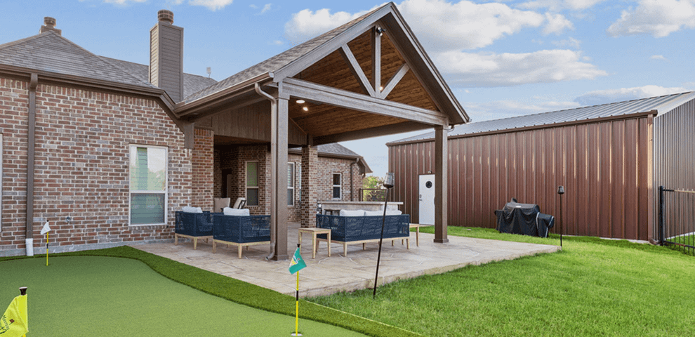 open gable patio cover outdoor kitchen carvestone overlay