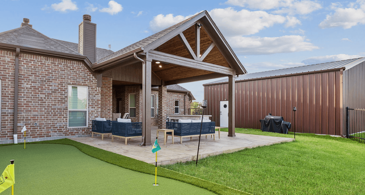 open gable patio cover outdoor kitchen carvestone overlay