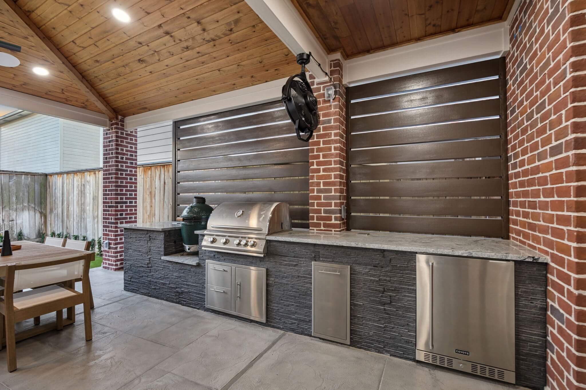 modern outdoor kitchen grill island carvestone overlay