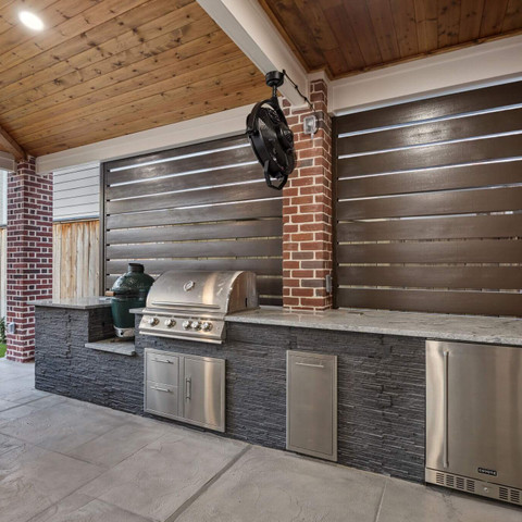 modern outdoor kitchen grill island carvestone overlay