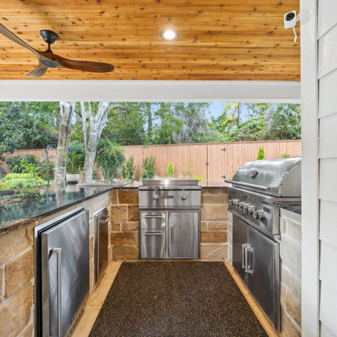 stone outdoor kitchen grilling island bar outdoor living