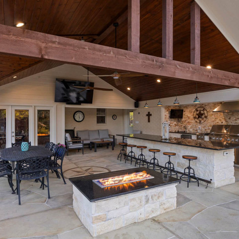 stone outdoor kitchen and bar island