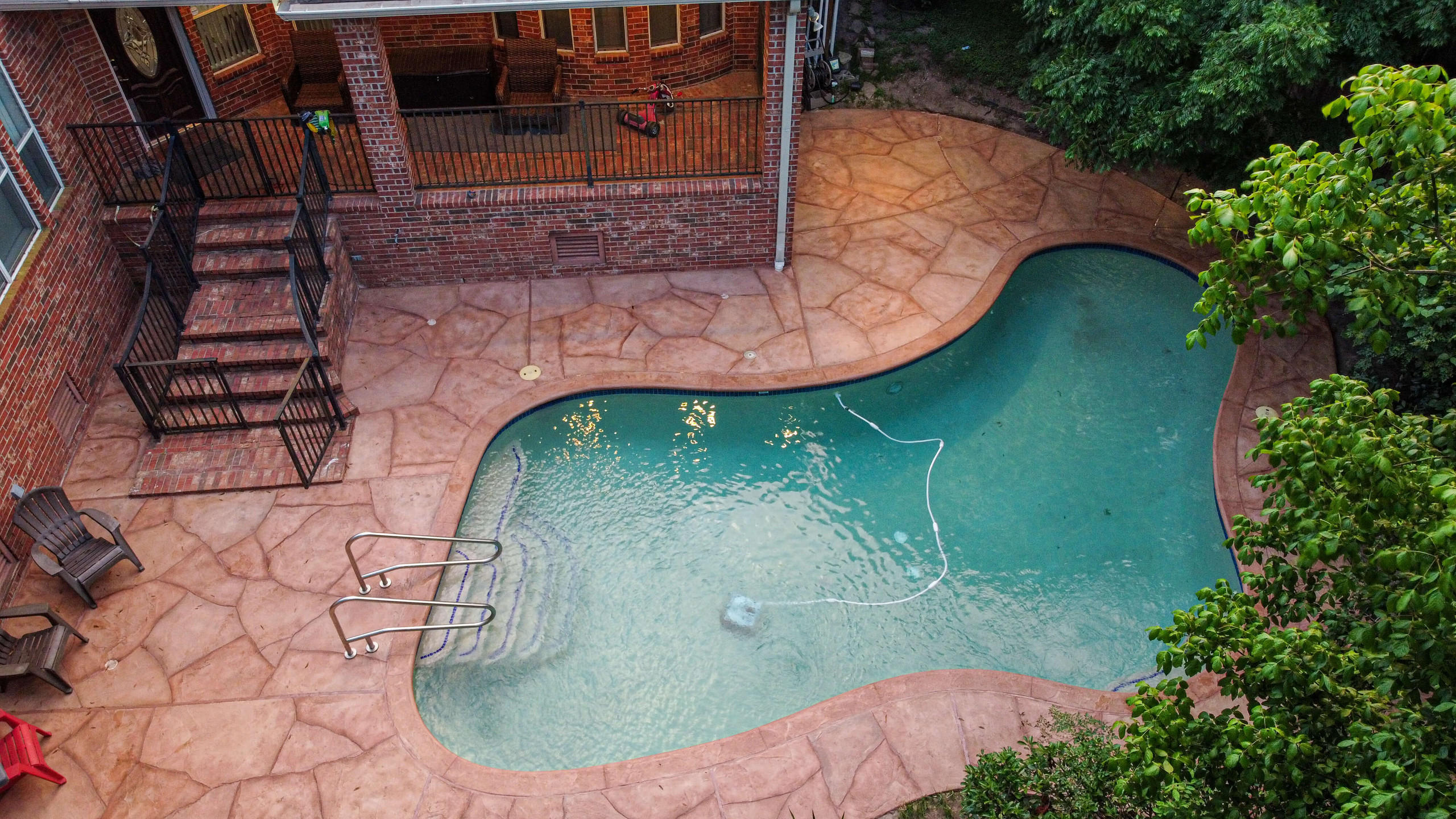 Carvestone pool decks in Houston Texas no tear-out needed hardscape design