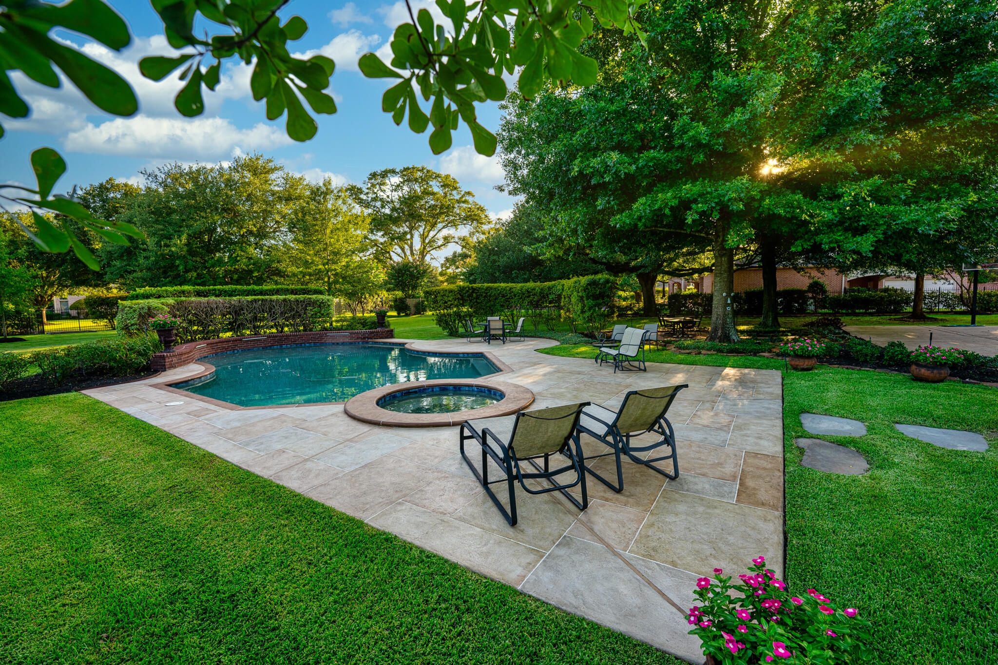Carvestone pool deck overlay patio design idea custom hardscape in Texas