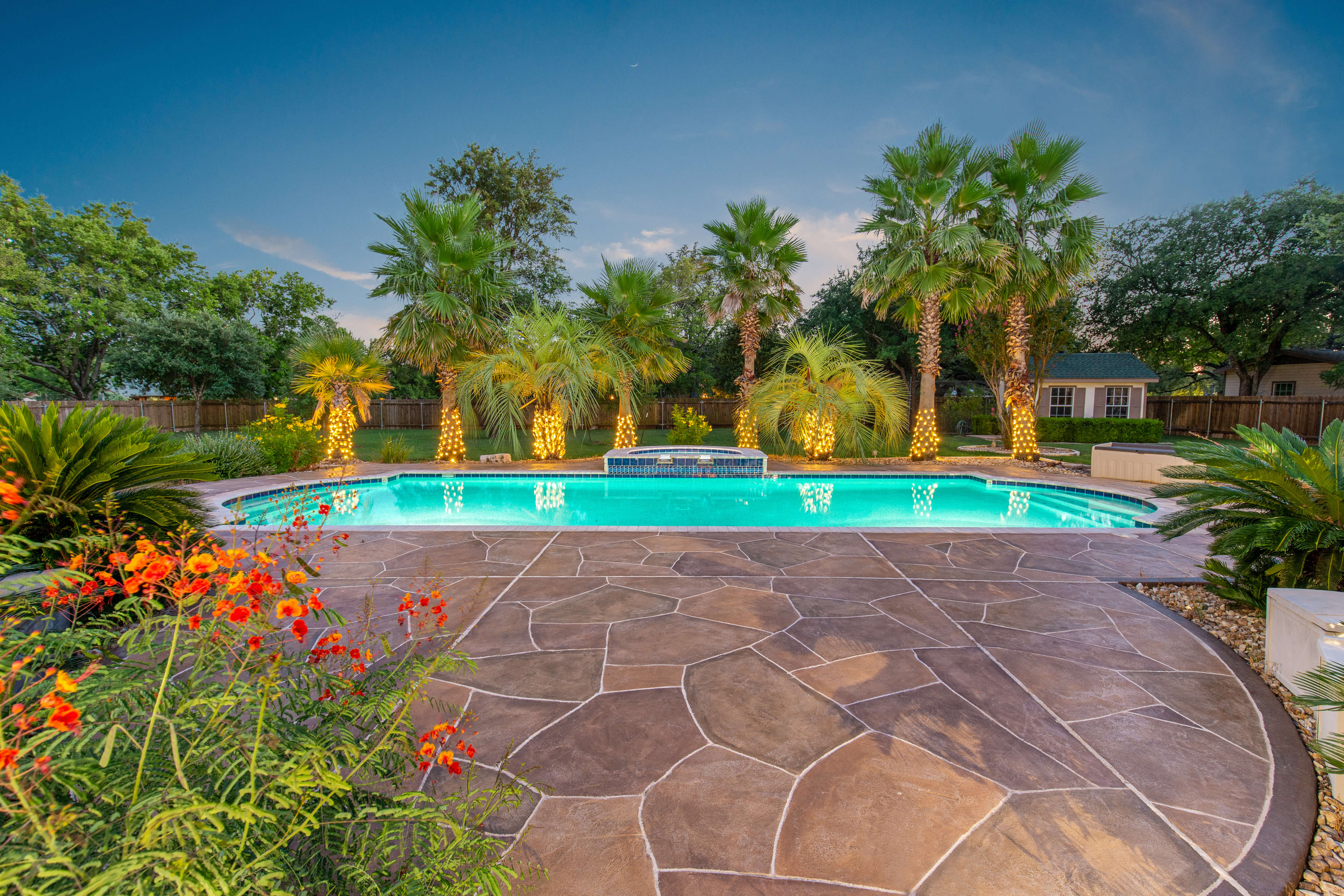 Carvestone overlay pool decking hardscape brown flagstone design