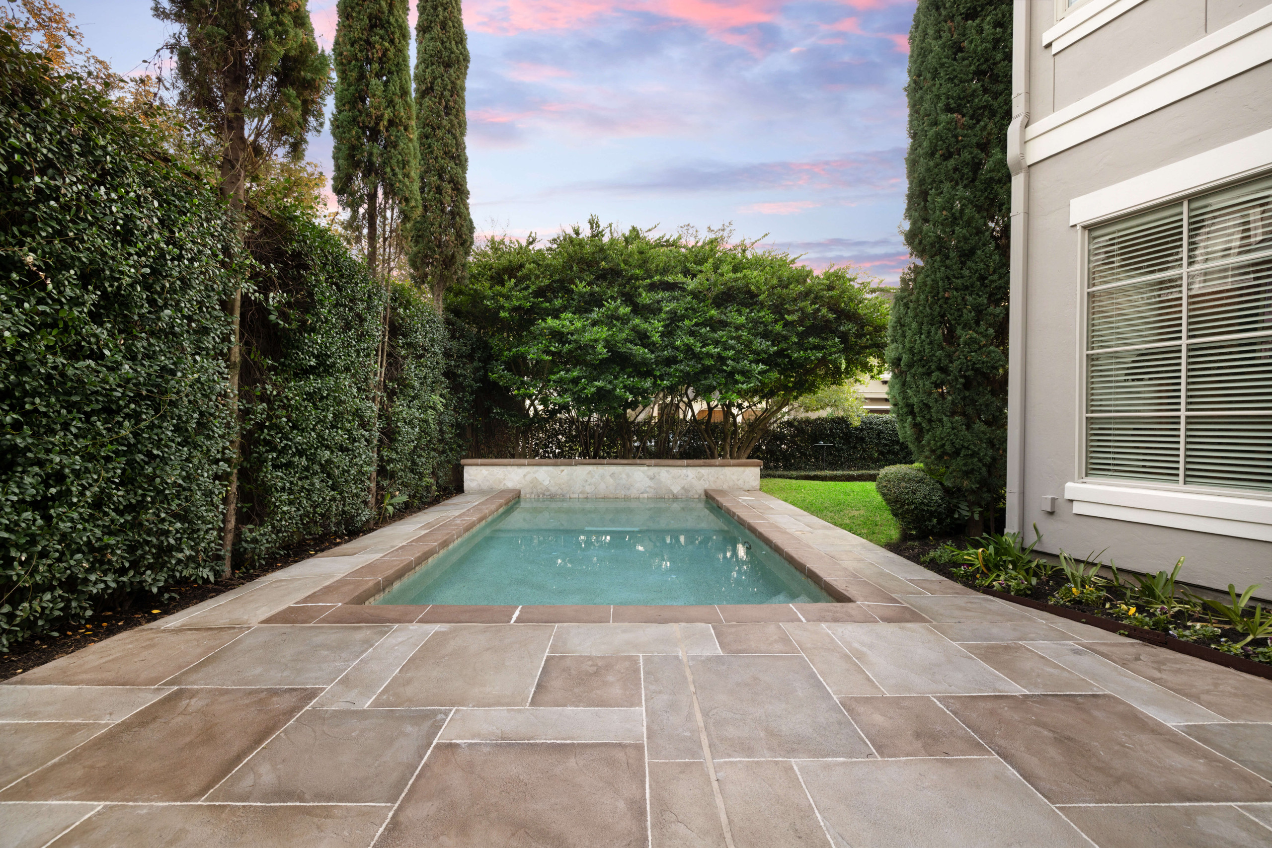 Carvestone overlay pool deck slip resistant and no tear-out needed.