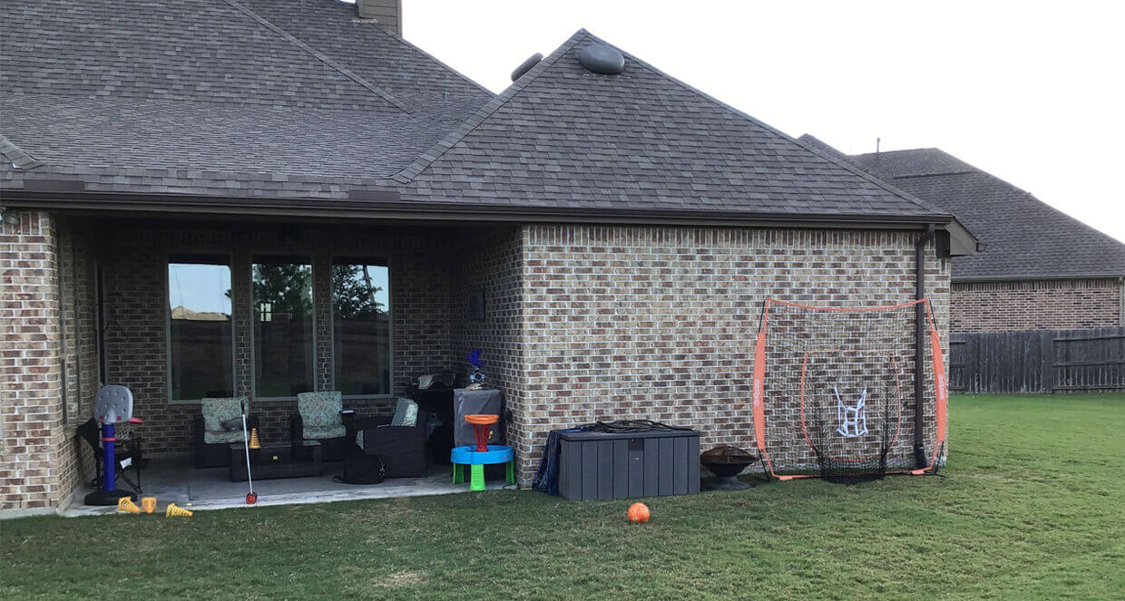 Patio cover addition shade structure upgraded outdoor living space Houston