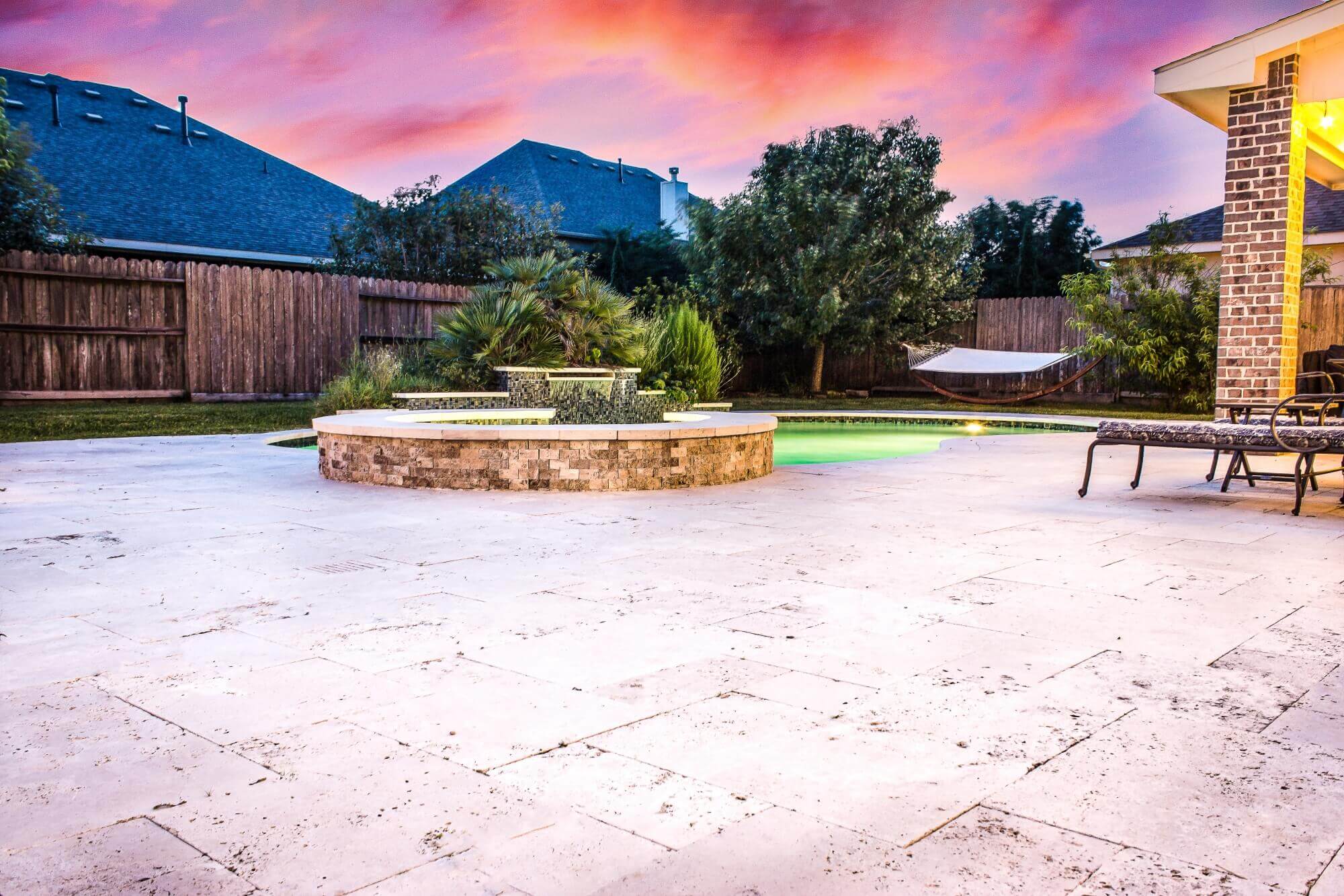 Modern design travertine pool decking idea hardscape Houston Texas