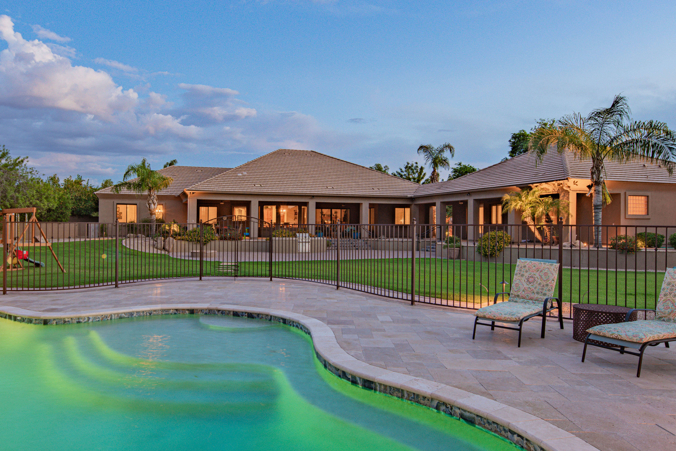 Travertine paver pool decking Phoenix Arizona poolside backyard hardscape