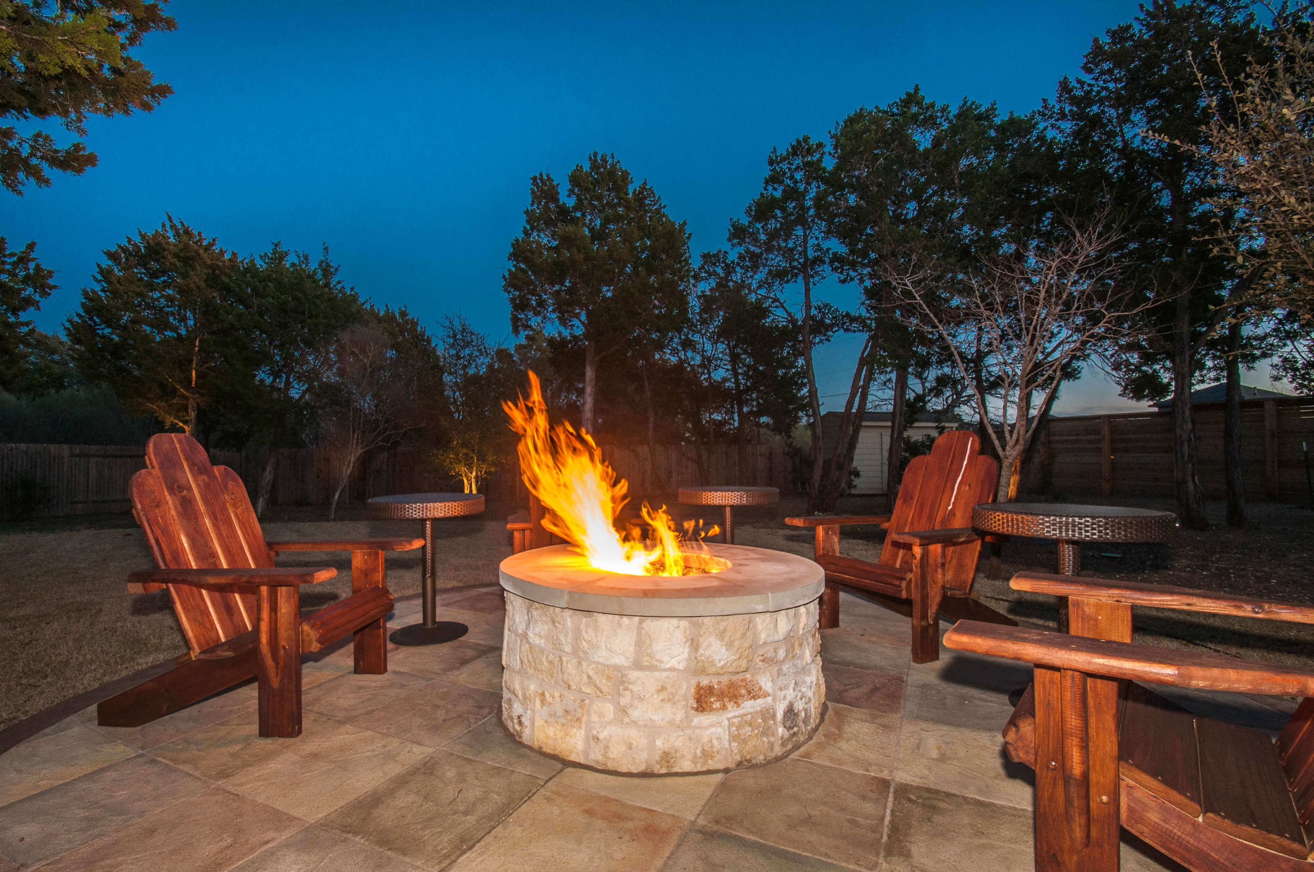 Custom built stone firepit on a carvestone patio