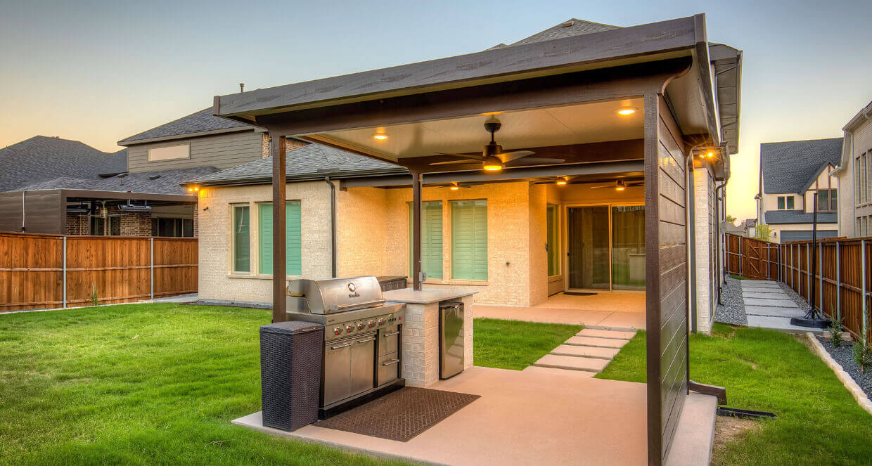 Outdoor kitchen patio cover addition Dallas backyard renovation