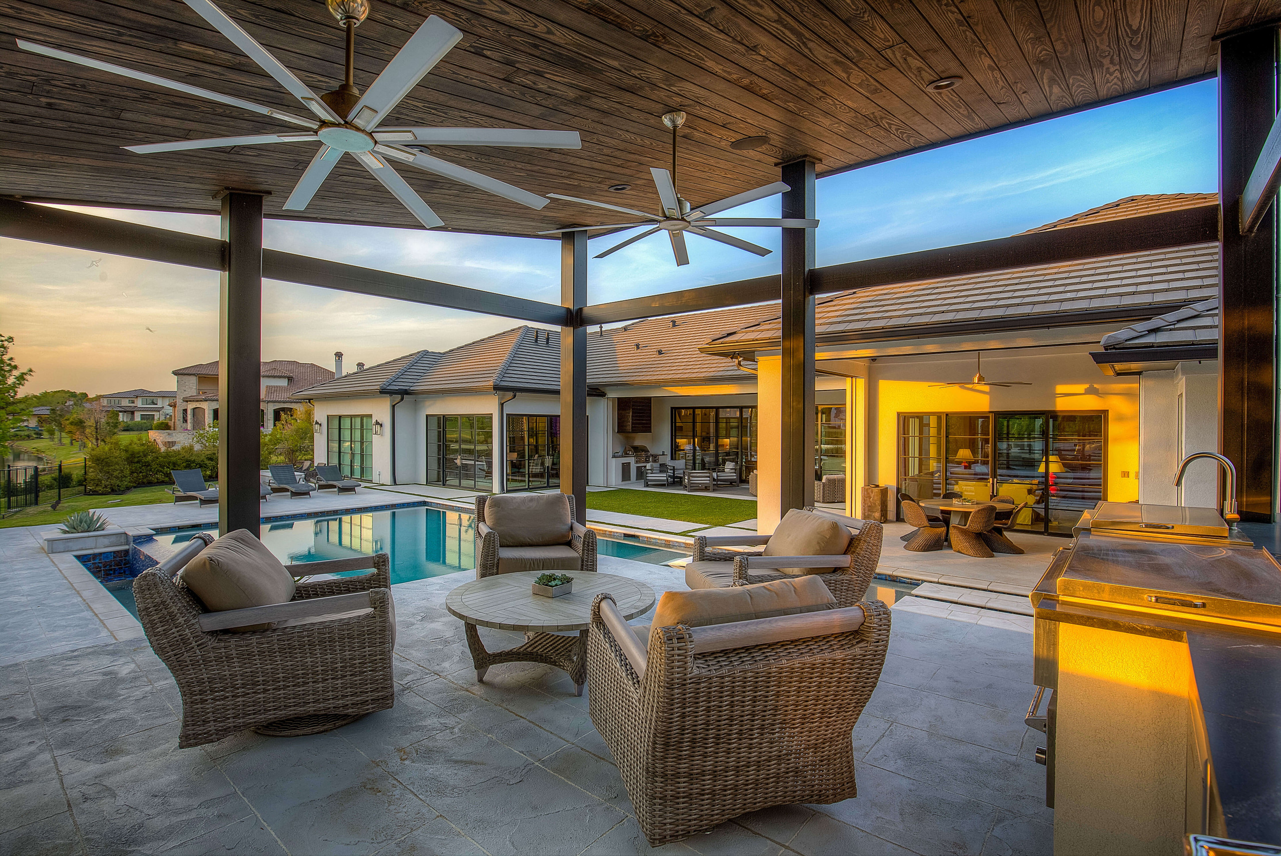 Shaded patio cover area with modern style outdoor furniture