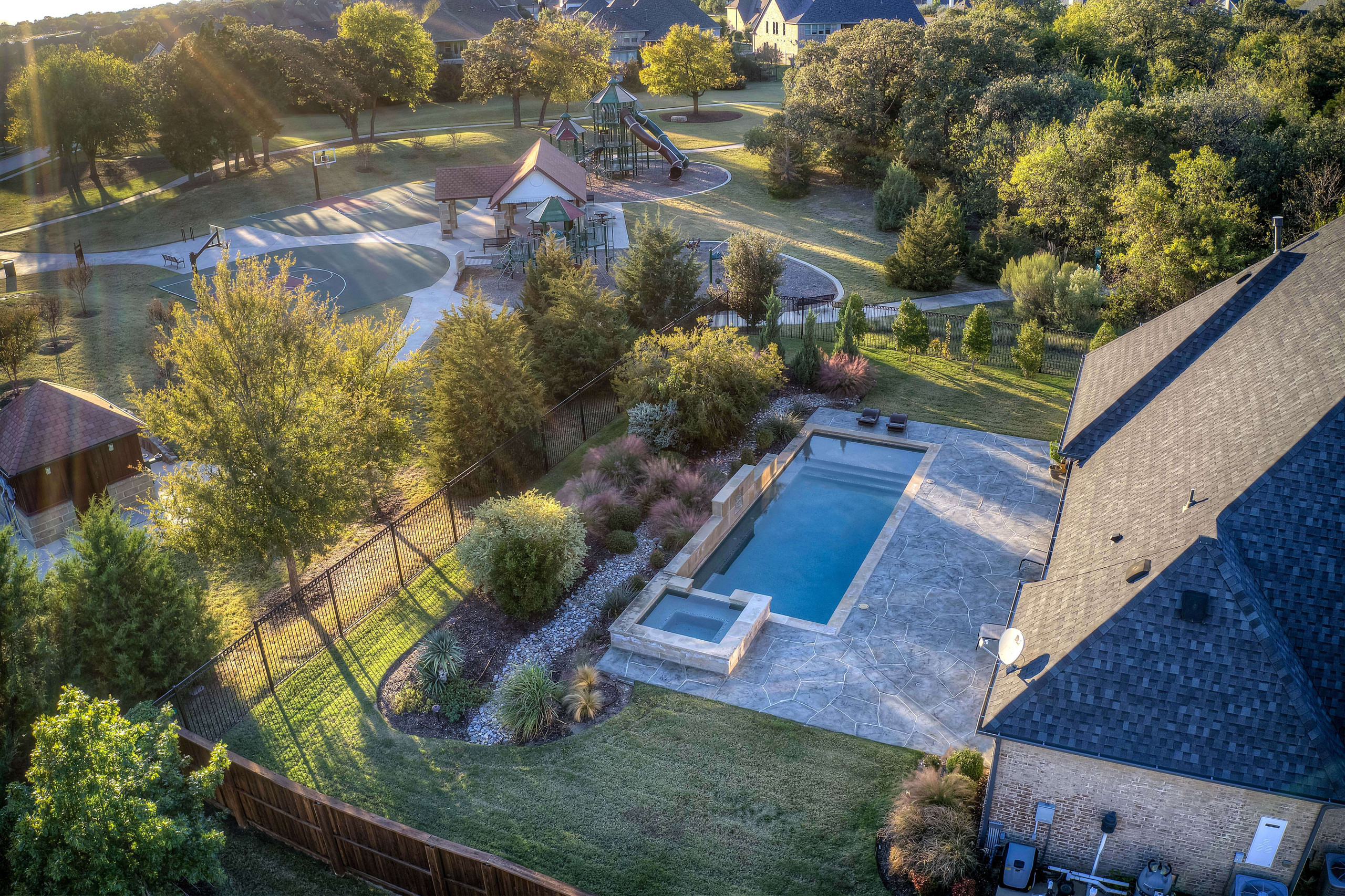 custom backyard pool carvestone pool decking spa