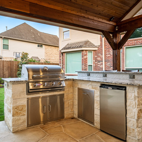 custom built stone outdoor kitchen