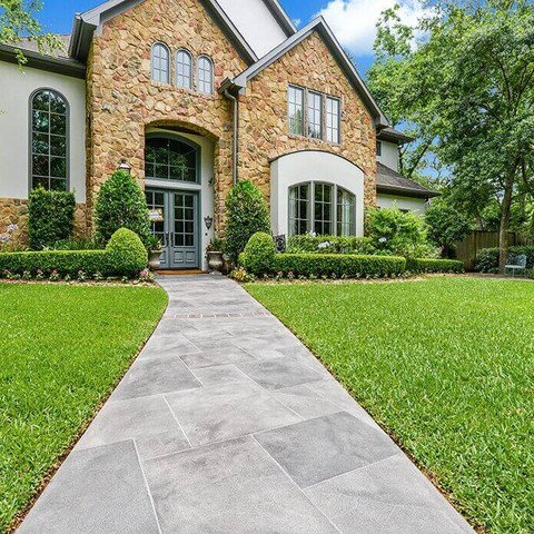 Entryway with grey carvestone design hand-carved and custom product