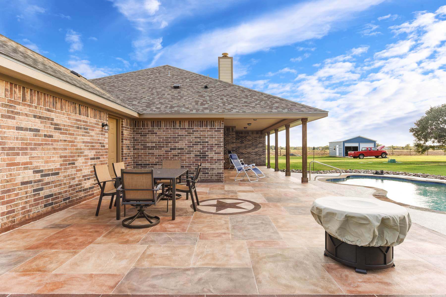 Carvestone concrete overlay hand-troweled patio design idea Houston texas