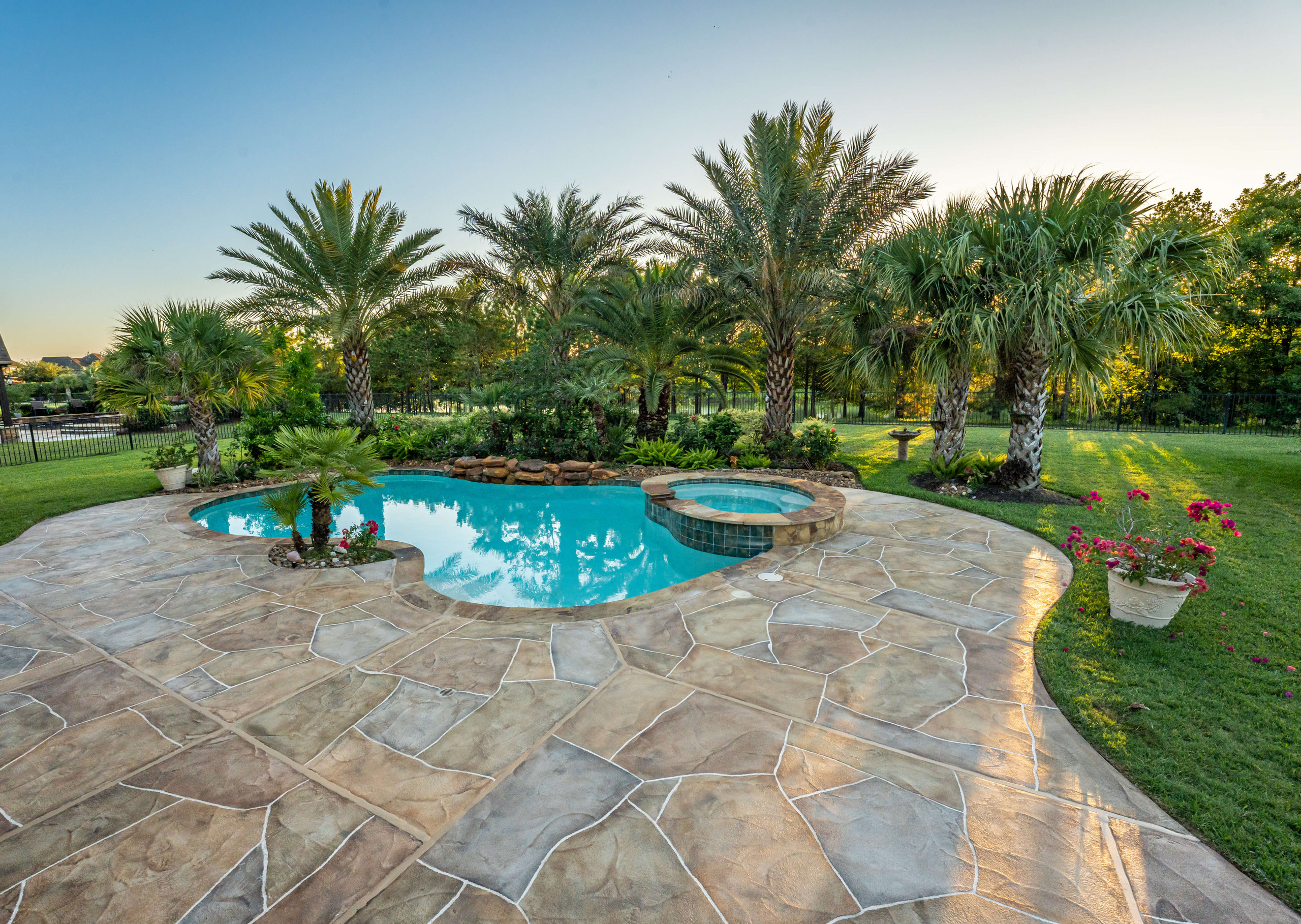 Custom carvestone pool deck no tear-out design overlay in Houston Texas